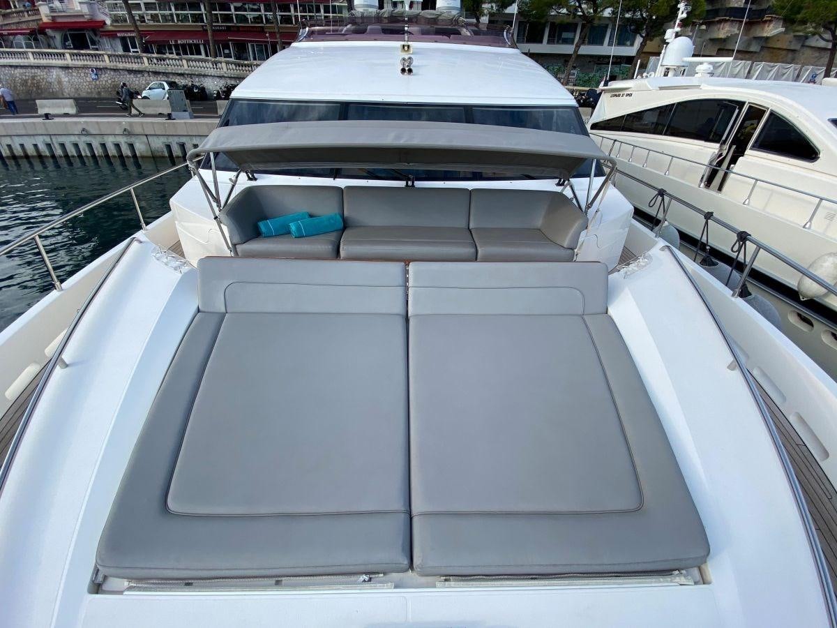 a boat parked on a dock aboard MOONDANCER Yacht for Sale