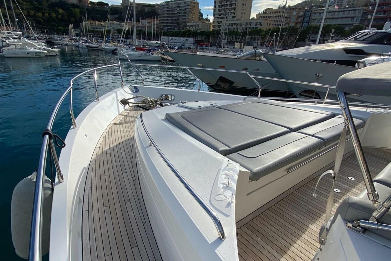 a group of boats in a harbor aboard MOONDANCER Yacht for Sale