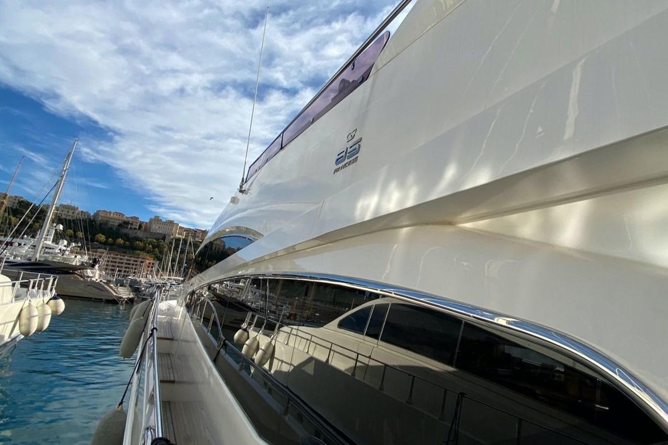 a boat docked at a pier aboard MOONDANCER Yacht for Sale