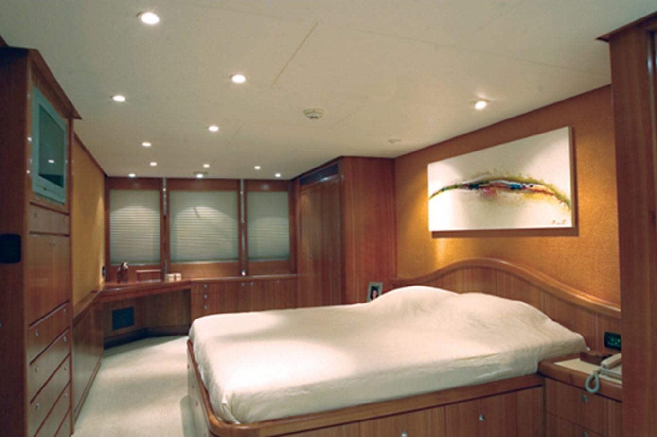 a bedroom with a large bed aboard FORTALEZA 85 SERIES  Yacht for Sale