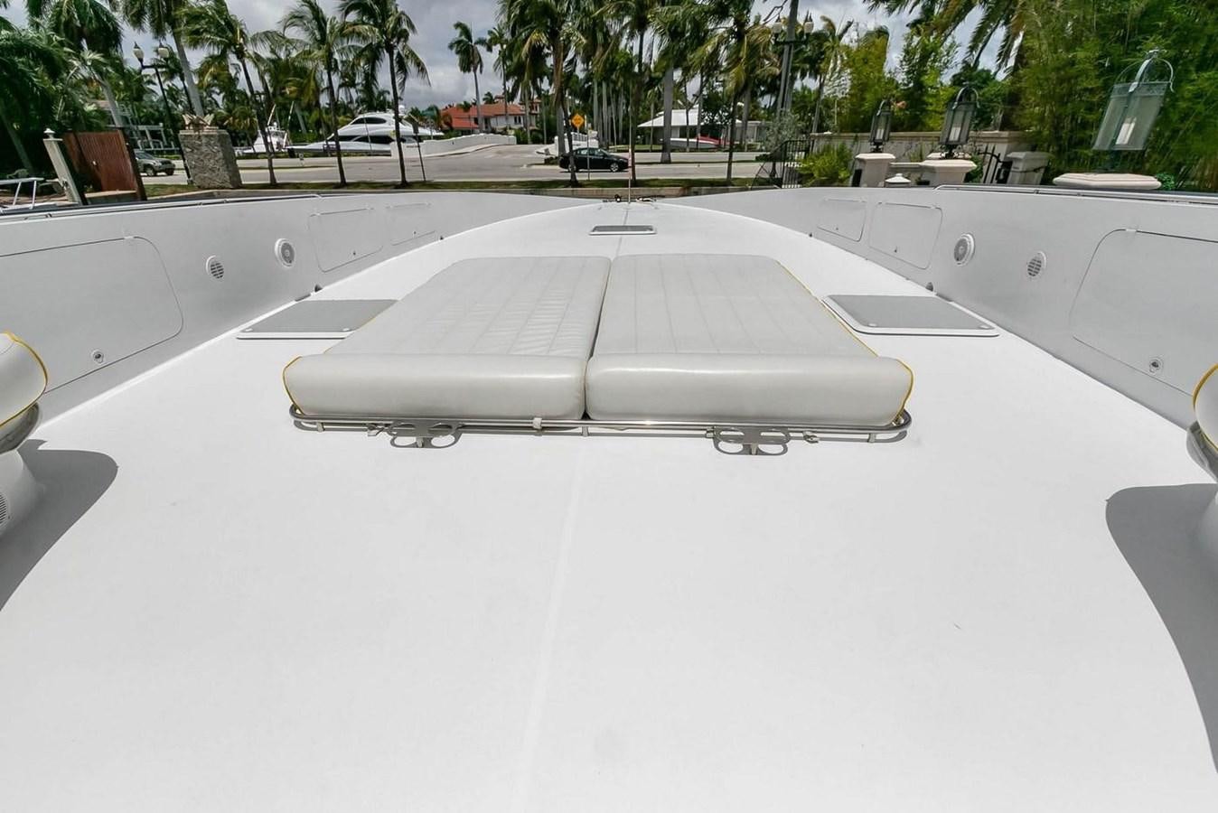 a white airplane on a white surface aboard PURELY PLEASURE Yacht for Sale