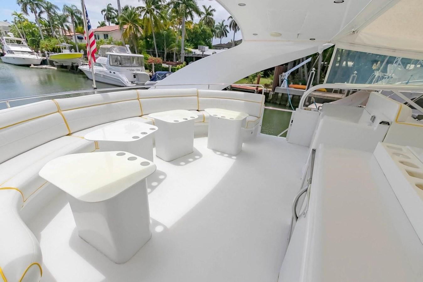 a row of white toilets on a boat aboard PURELY PLEASURE Yacht for Sale
