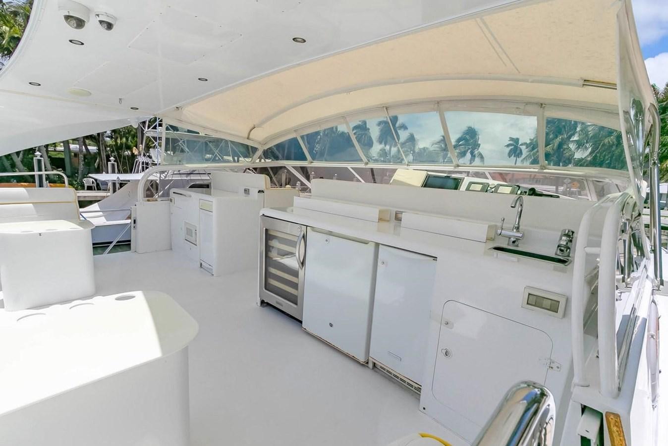 a room with white cabinets aboard PURELY PLEASURE Yacht for Sale