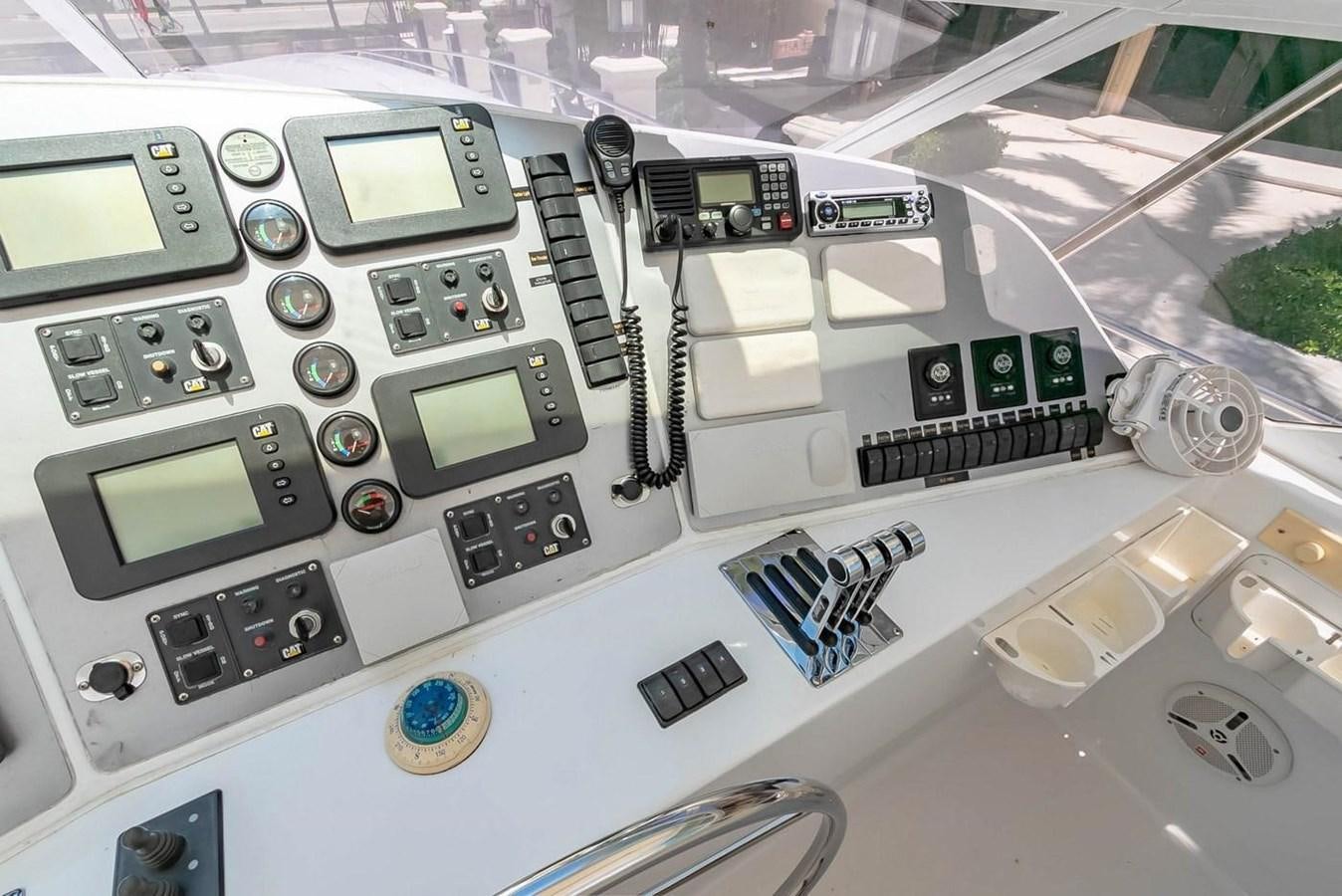 a machine with a screen and buttons aboard PURELY PLEASURE Yacht for Sale