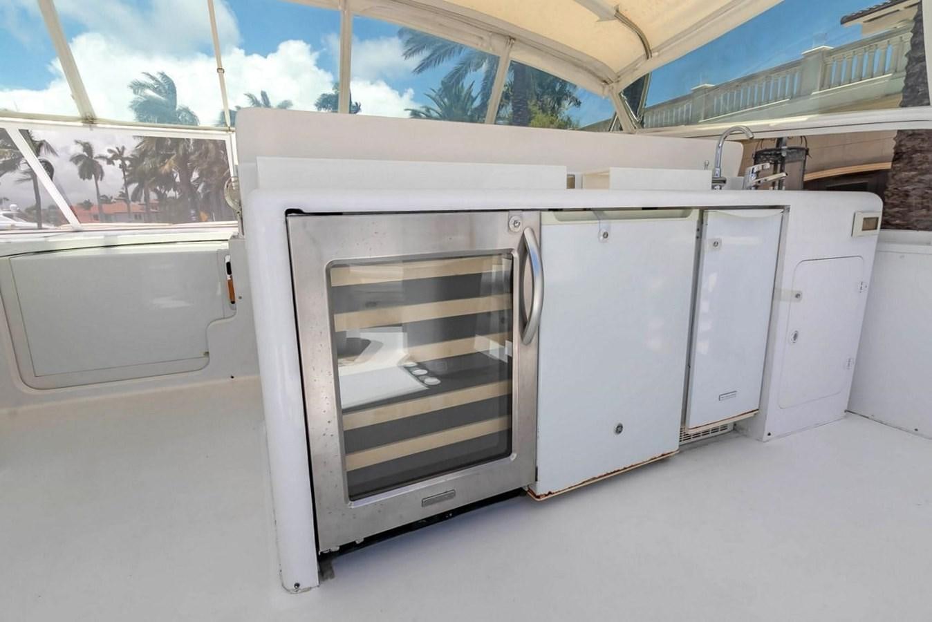 a large white kitchen aboard PURELY PLEASURE Yacht for Sale