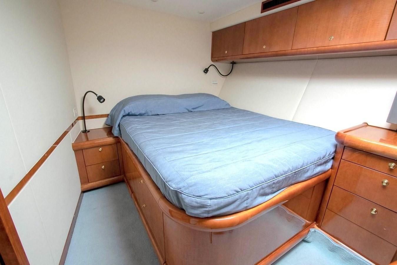 a bed in a room aboard PURELY PLEASURE Yacht for Sale