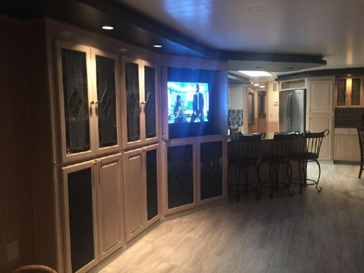 a room with a table and chairs aboard SUMERSET HOUSEBOAT Yacht for Sale