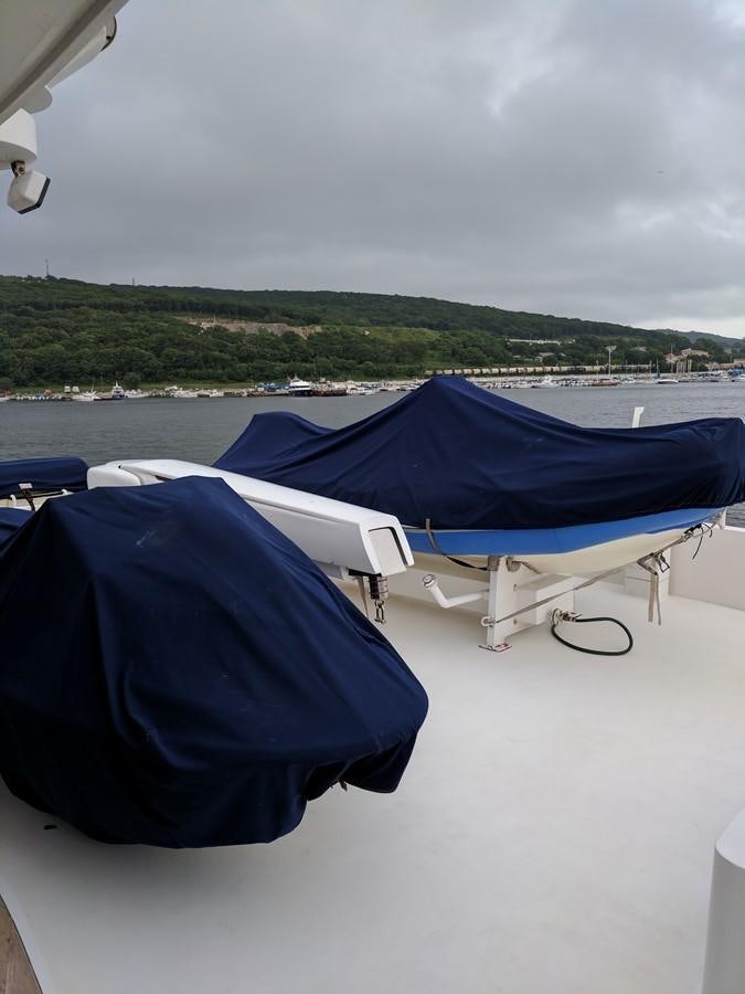 a blue tarp on a boat aboard FORTALEZA Yacht for Sale