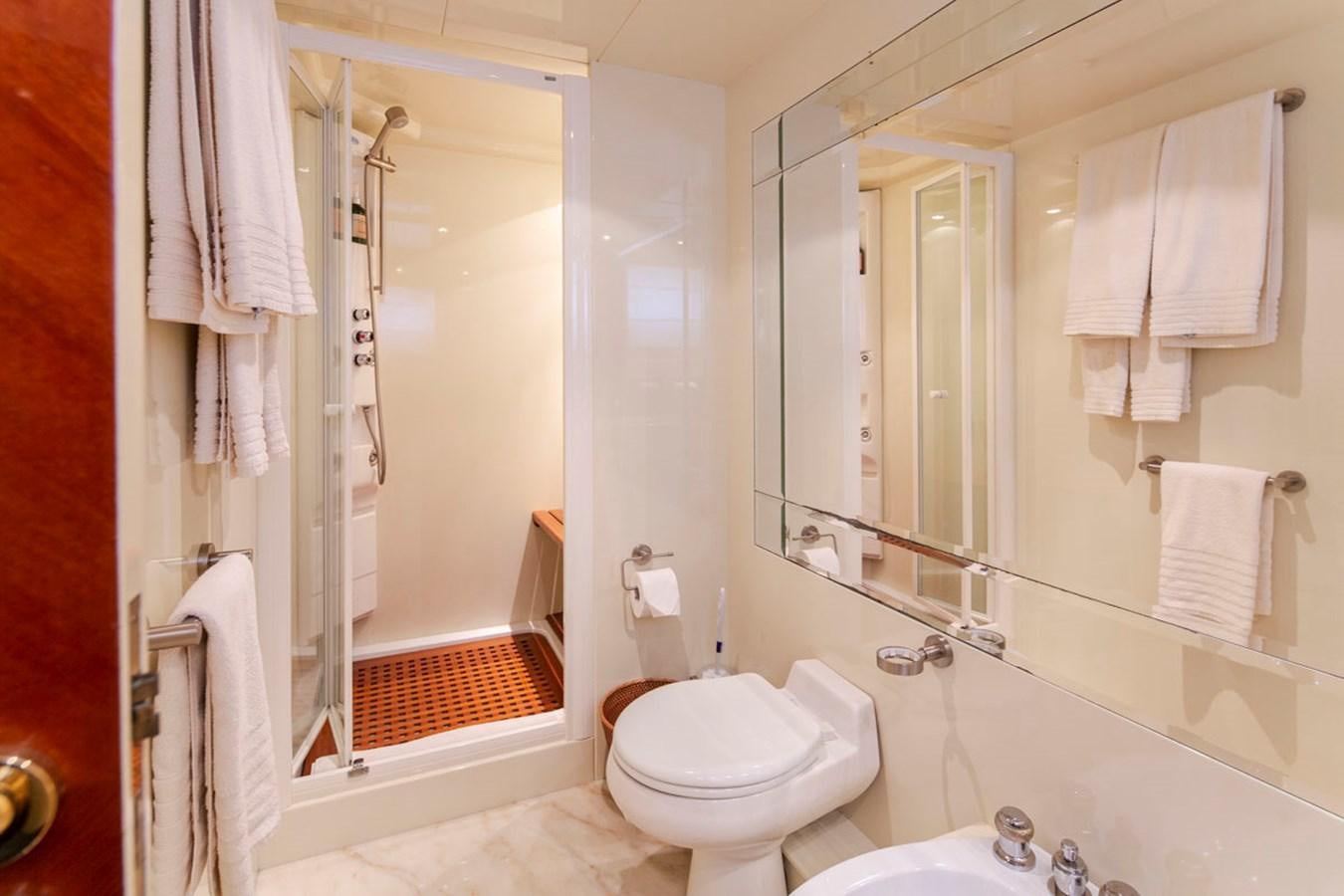 a bathroom with a toilet and a sink aboard SEA HAWK Yacht for Sale