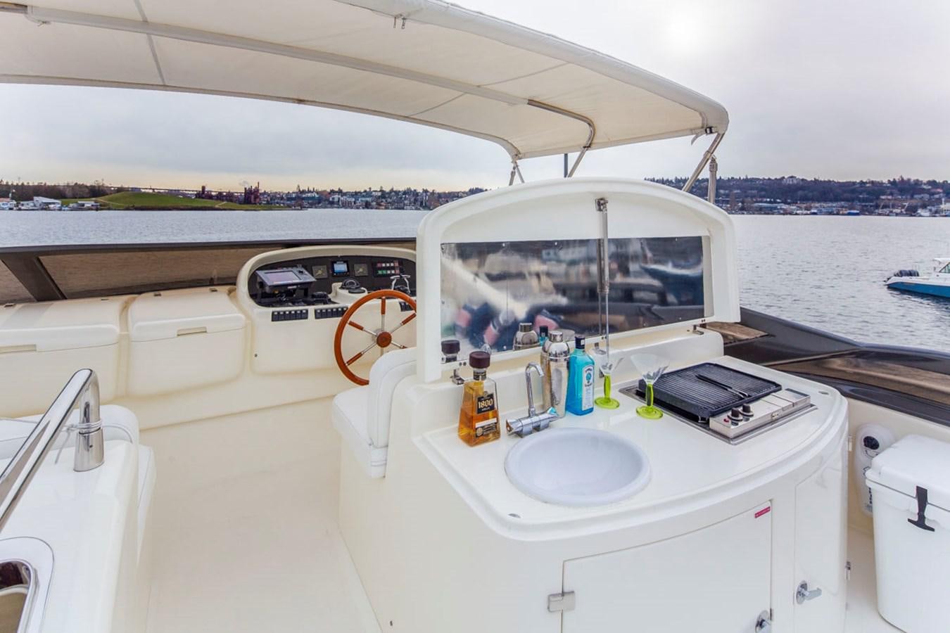 a white vehicle with a sink and a mirror on the roof aboard SEA HAWK Yacht for Sale