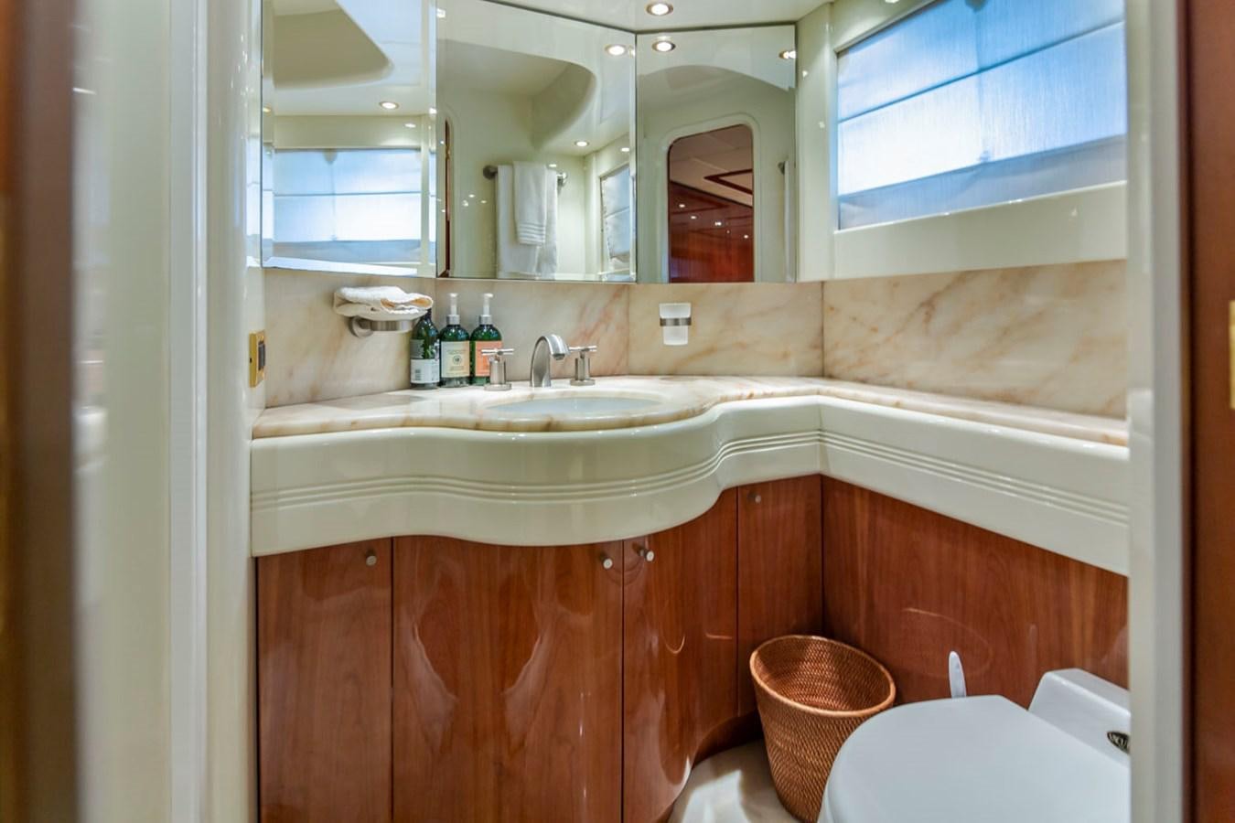 a bathroom with a sink and a mirror aboard SEA HAWK Yacht for Sale