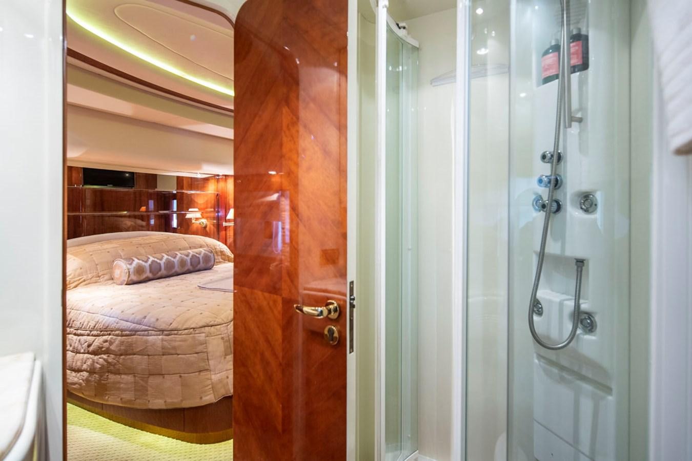 a room with a bed and a door aboard SEA HAWK Yacht for Sale