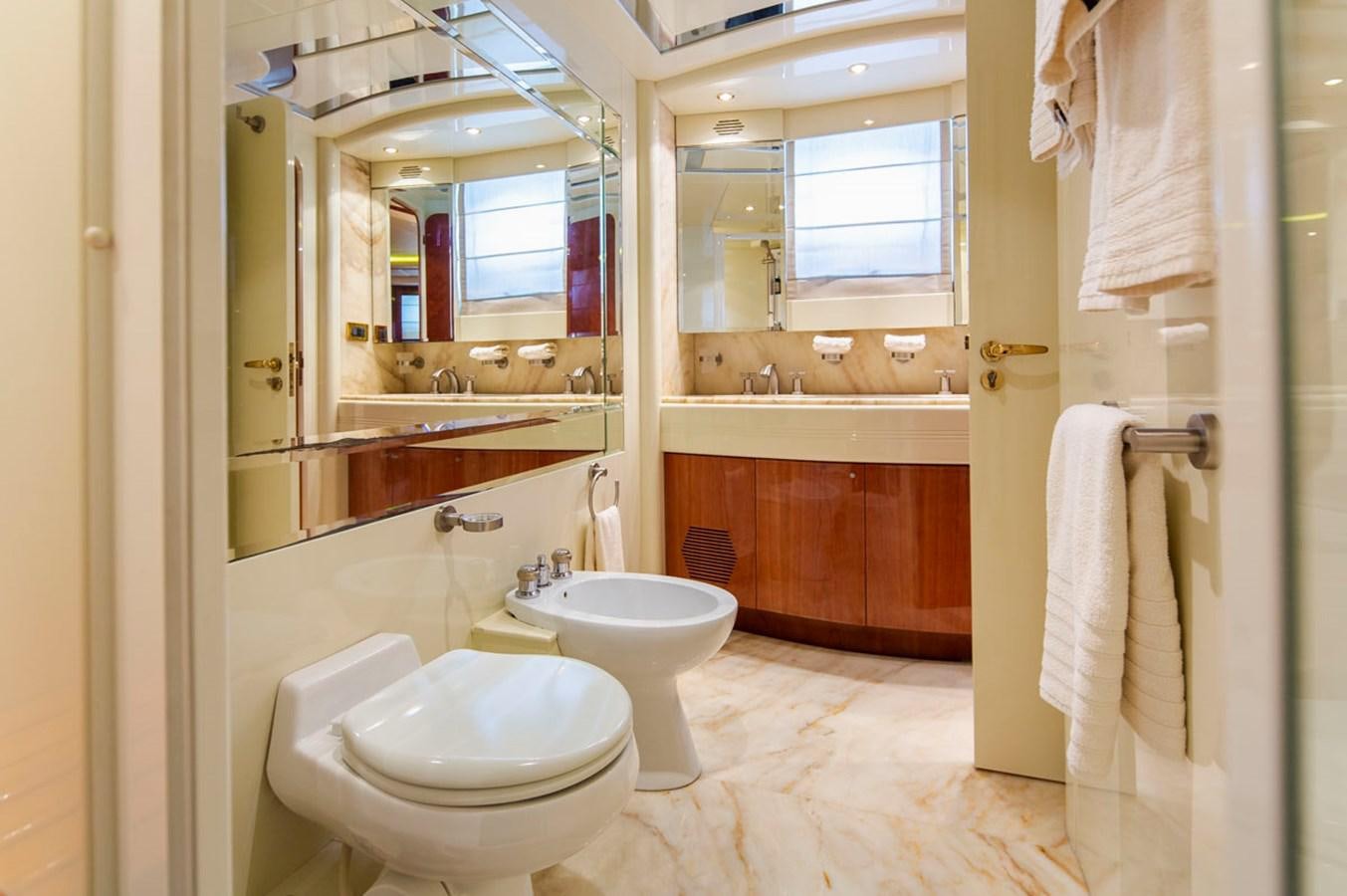 a bathroom with a toilet and sink aboard SEA HAWK Yacht for Sale