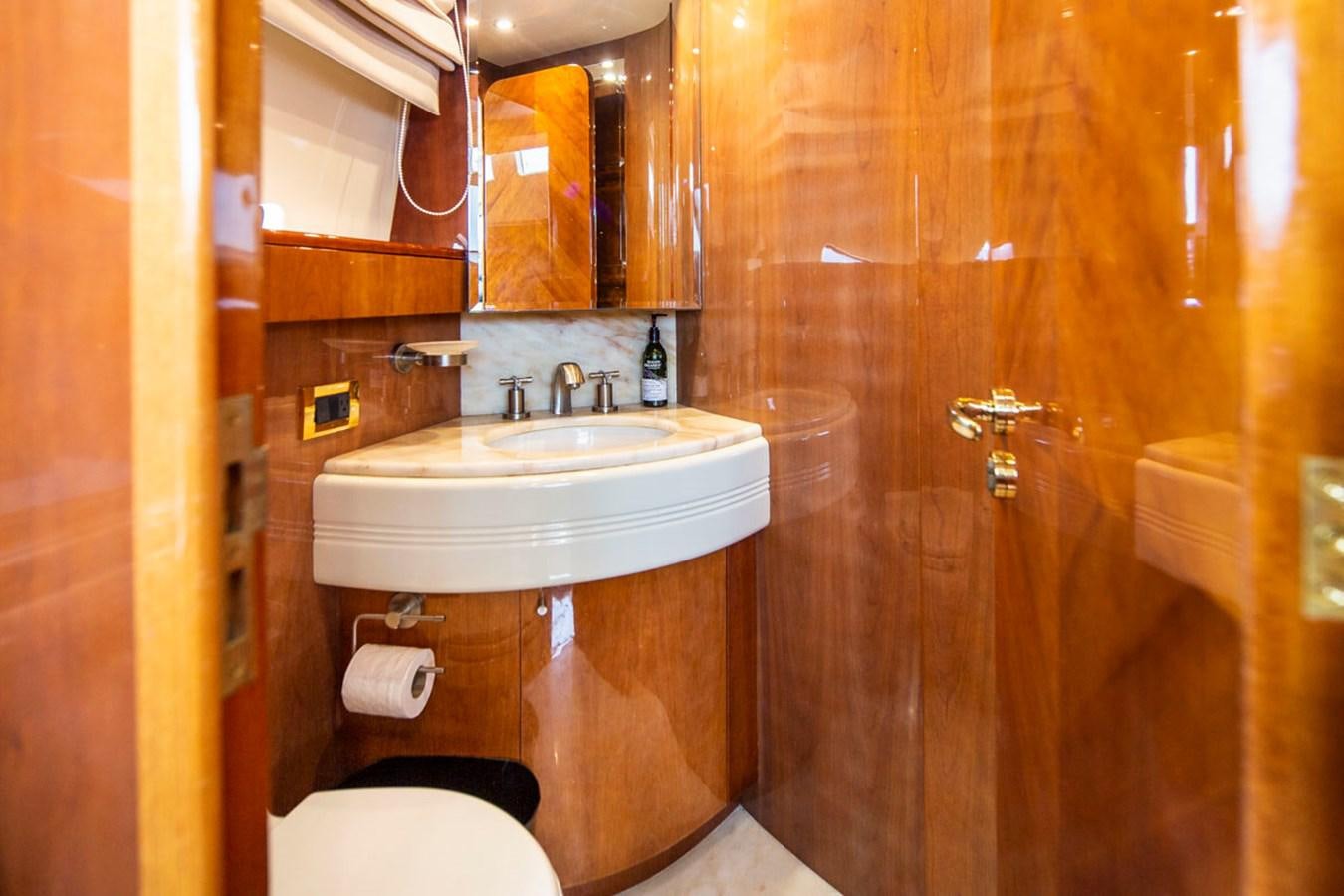 a bathroom with a sink and toilet aboard SEA HAWK Yacht for Sale