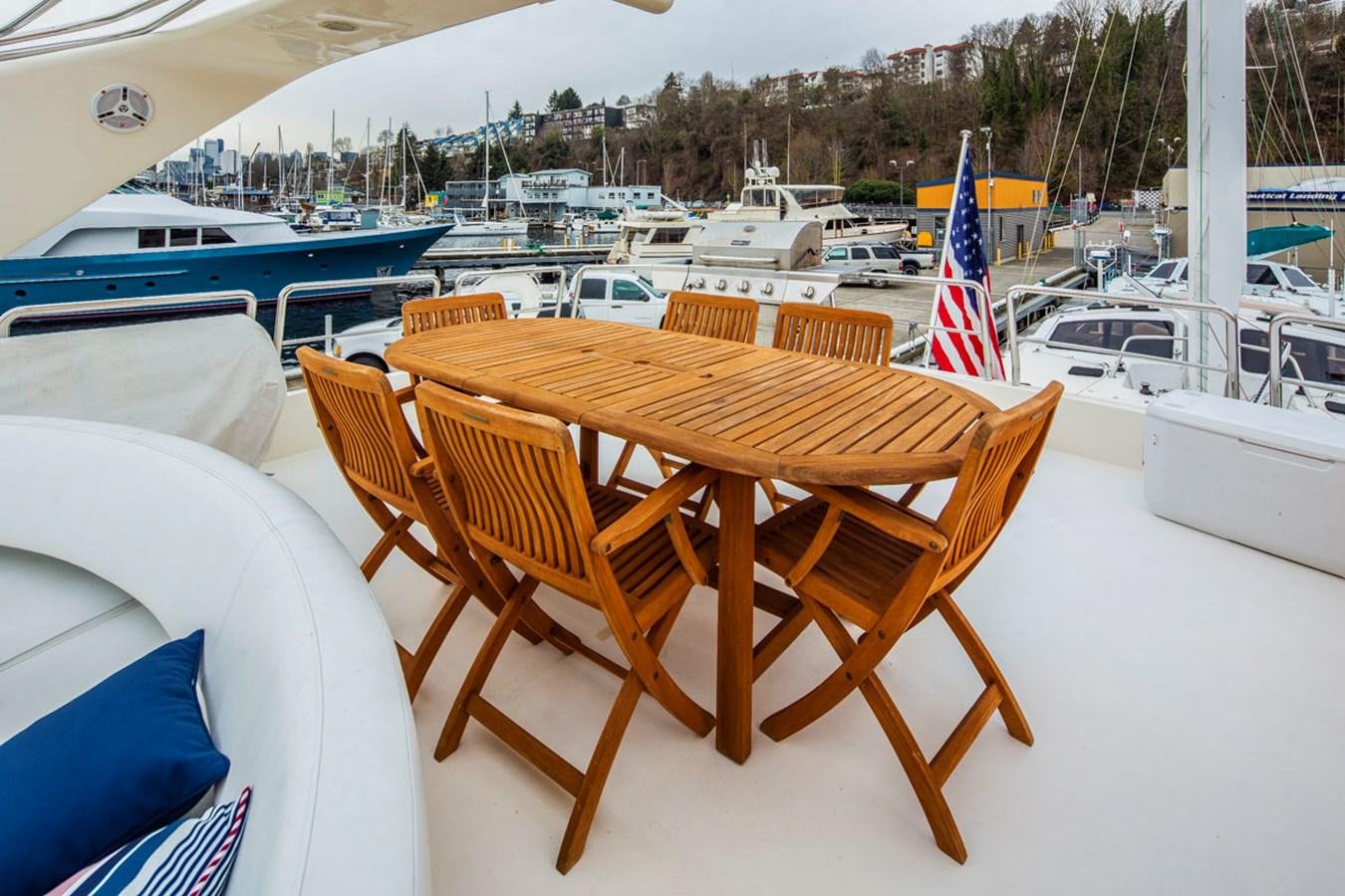 a wooden table on a boat dock aboard SEA HAWK Yacht for Sale
