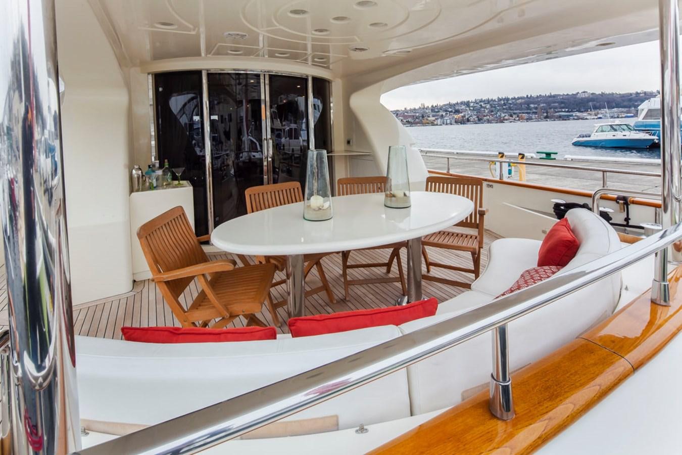a table and chairs in a room aboard SEA HAWK Yacht for Sale