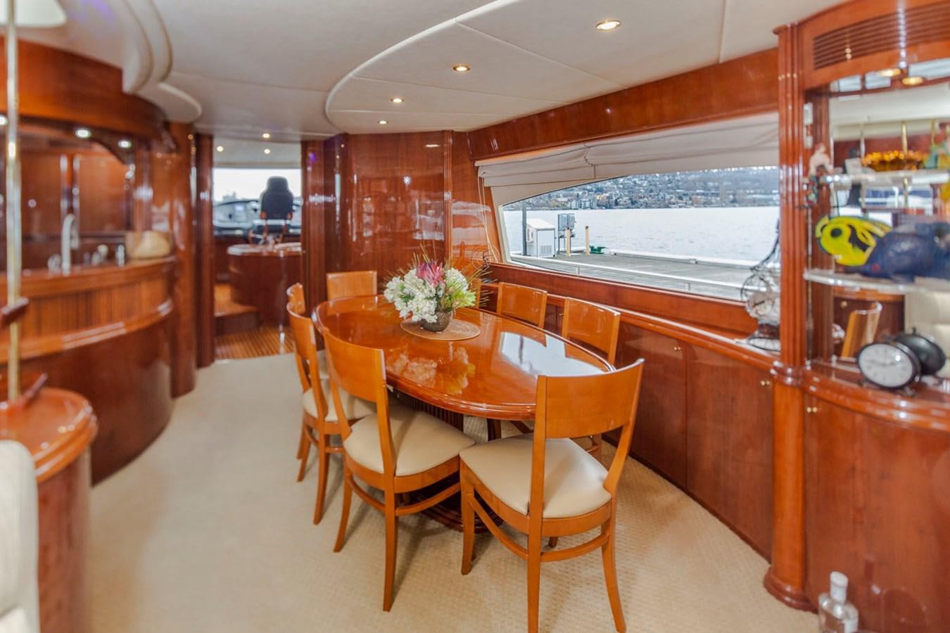 a dining room with a table and chairs aboard SEA HAWK Yacht for Sale