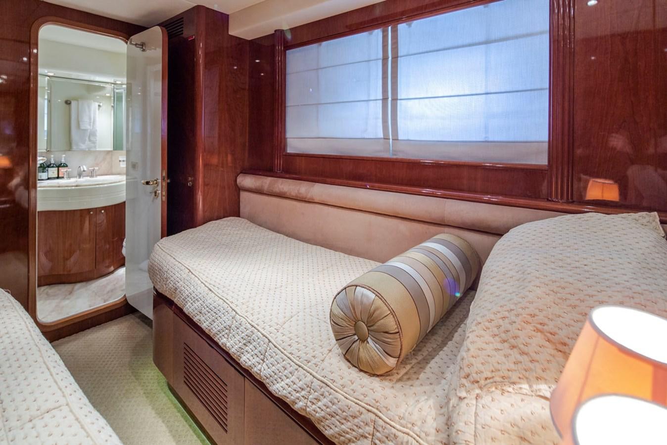 a bed with a pillow on it aboard SEA HAWK Yacht for Sale