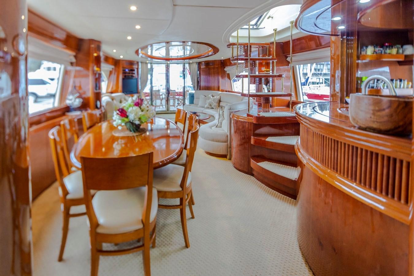a dining room with a table and chairs aboard SEA HAWK Yacht for Sale