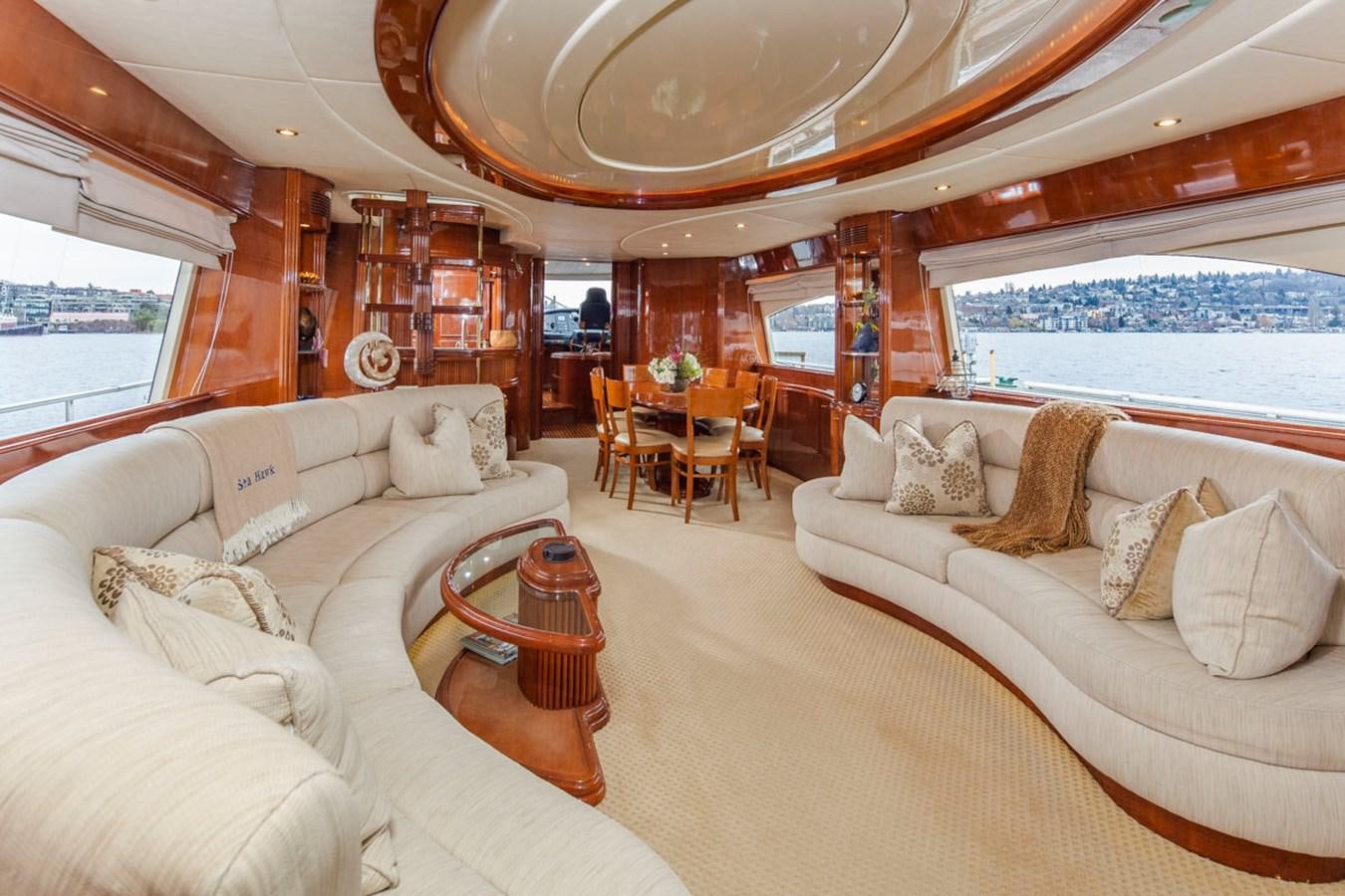 a living room with a large window aboard SEA HAWK Yacht for Sale