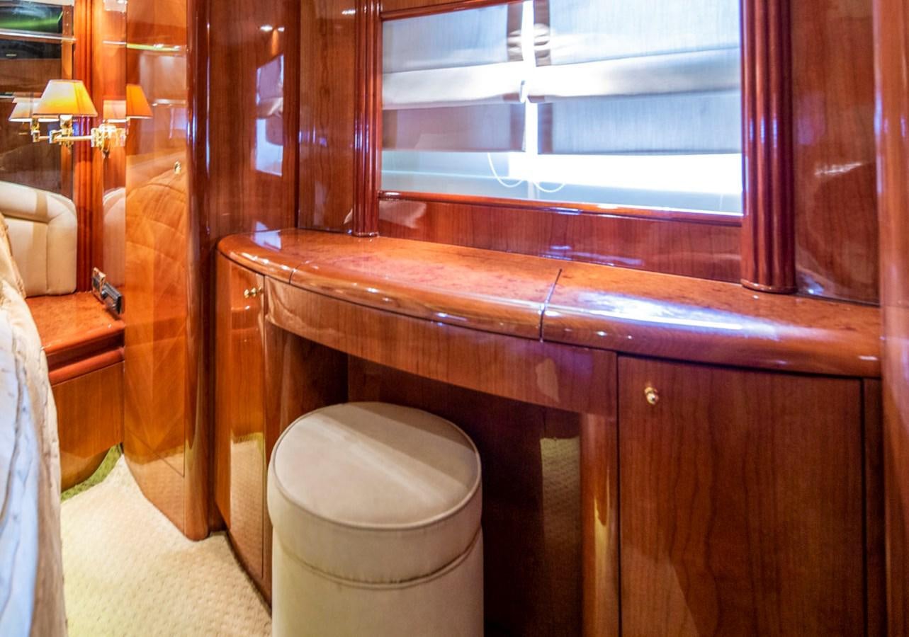a toilet with a wooden seat aboard SEA HAWK Yacht for Sale
