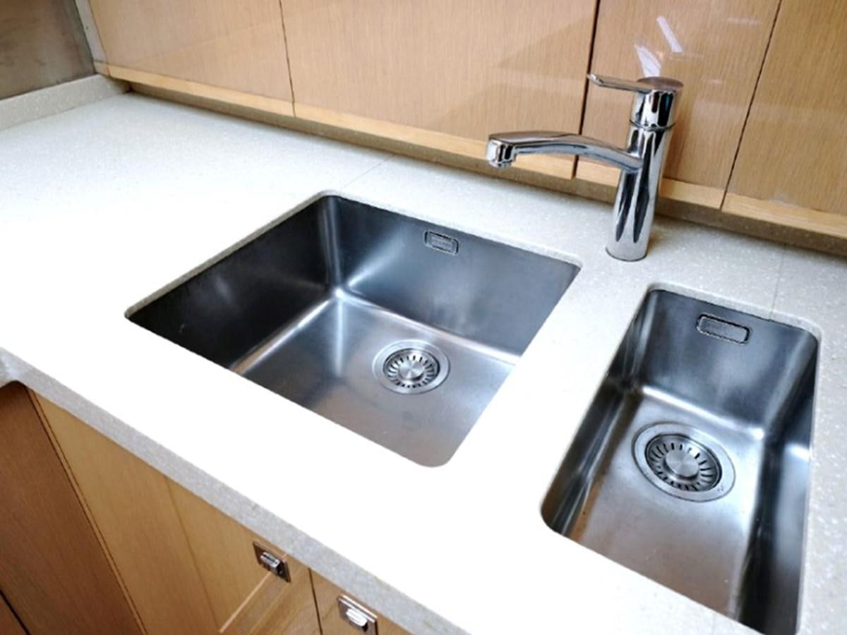 a sink and a faucet in a kitchen aboard PRINCESS V85 Yacht for Sale