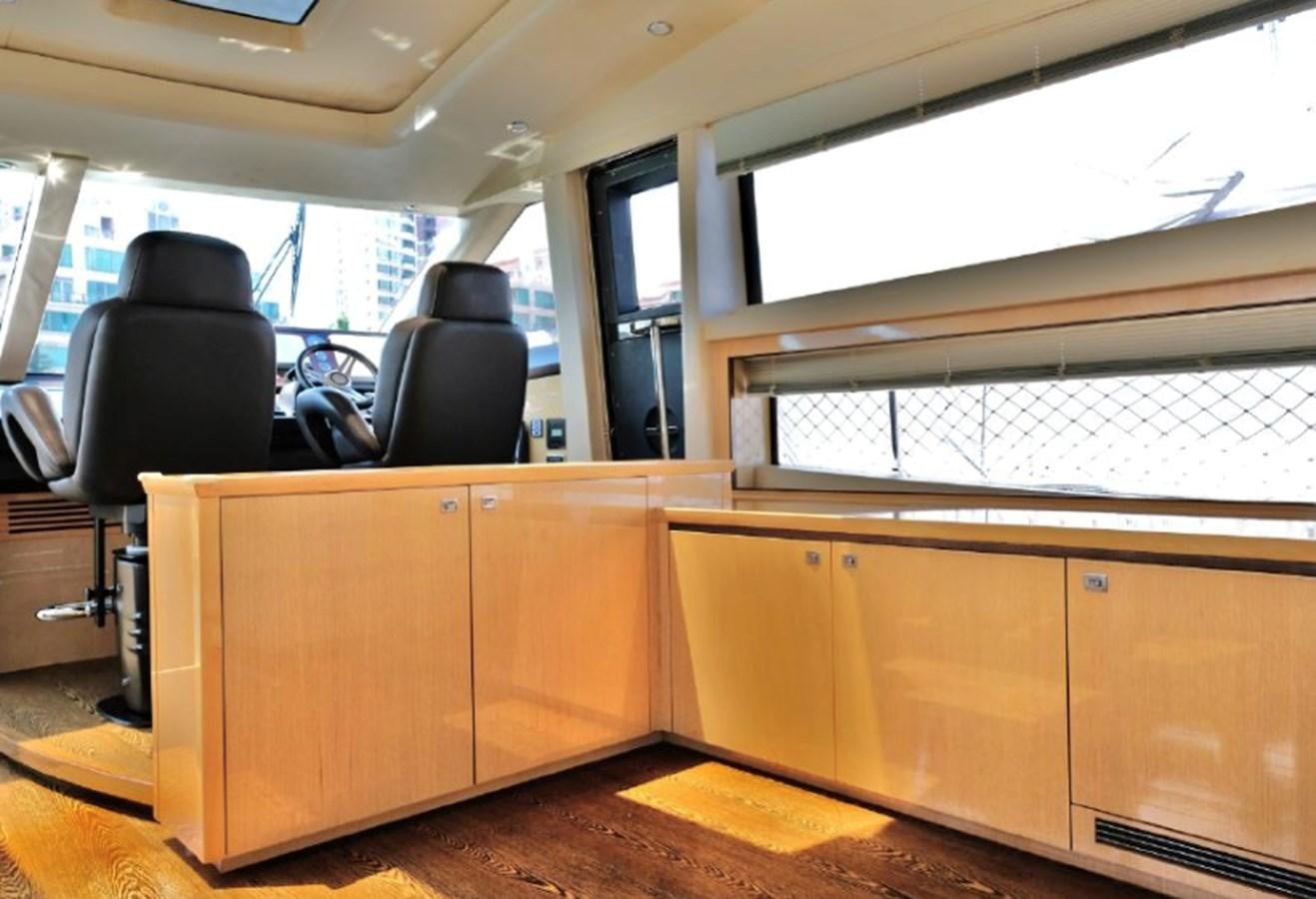 a room with a chair and a desk aboard PRINCESS V85 Yacht for Sale