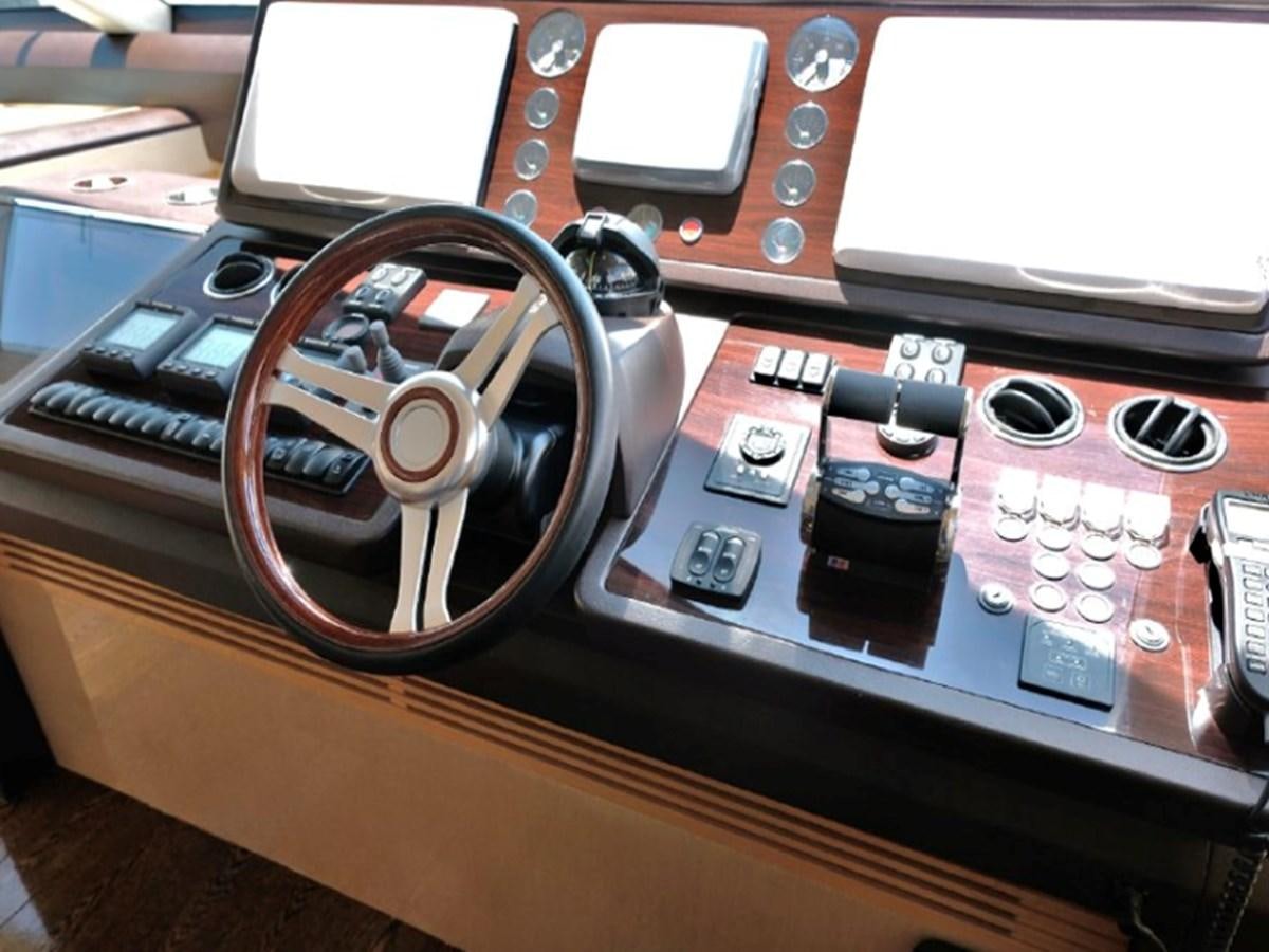 a close-up of a car stereo aboard PRINCESS V85 Yacht for Sale