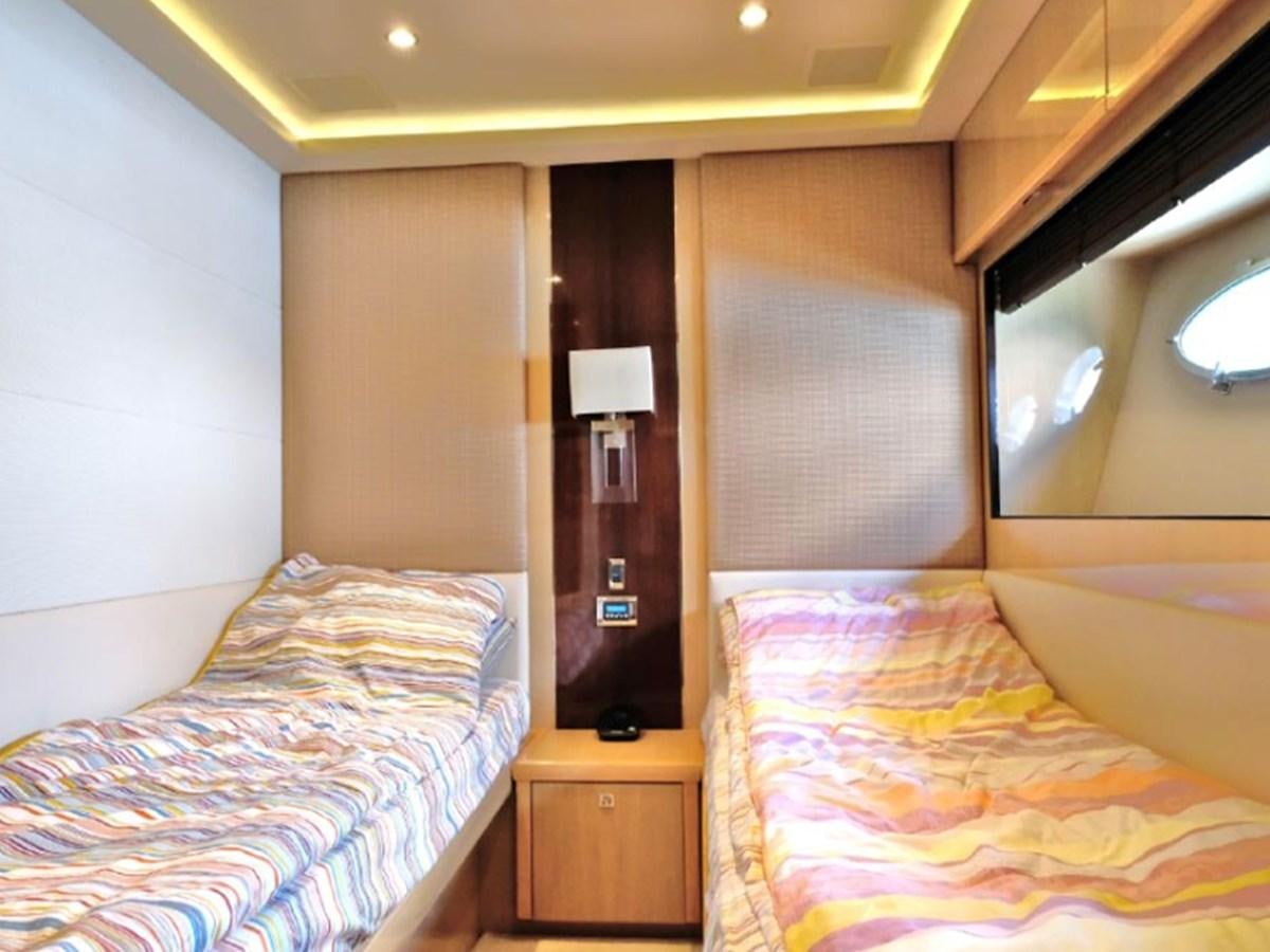 a room with two beds aboard PRINCESS V85 Yacht for Sale