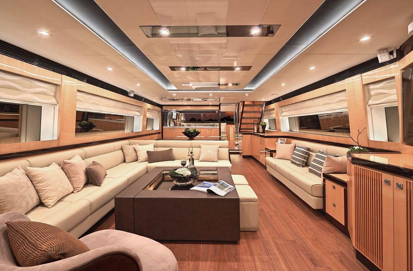 a living room with a couch and a coffee table aboard E84 (NEW BOAT SPEC)  Yacht for Sale