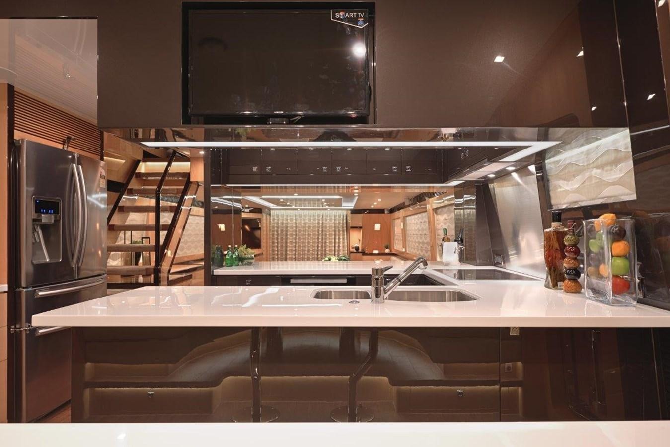 a kitchen with a stove and a sink aboard E84 (NEW BOAT SPEC)  Yacht for Sale