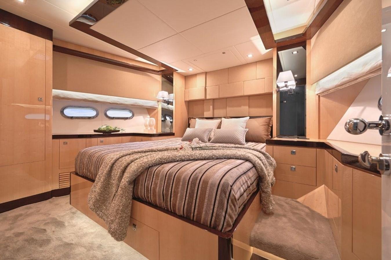 a bedroom with a bed aboard E84 (NEW BOAT SPEC)  Yacht for Sale