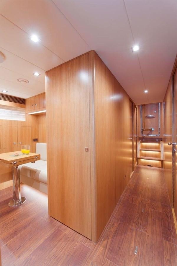 a wood cabinet in a room aboard E84 (NEW BOAT SPEC)  Yacht for Sale