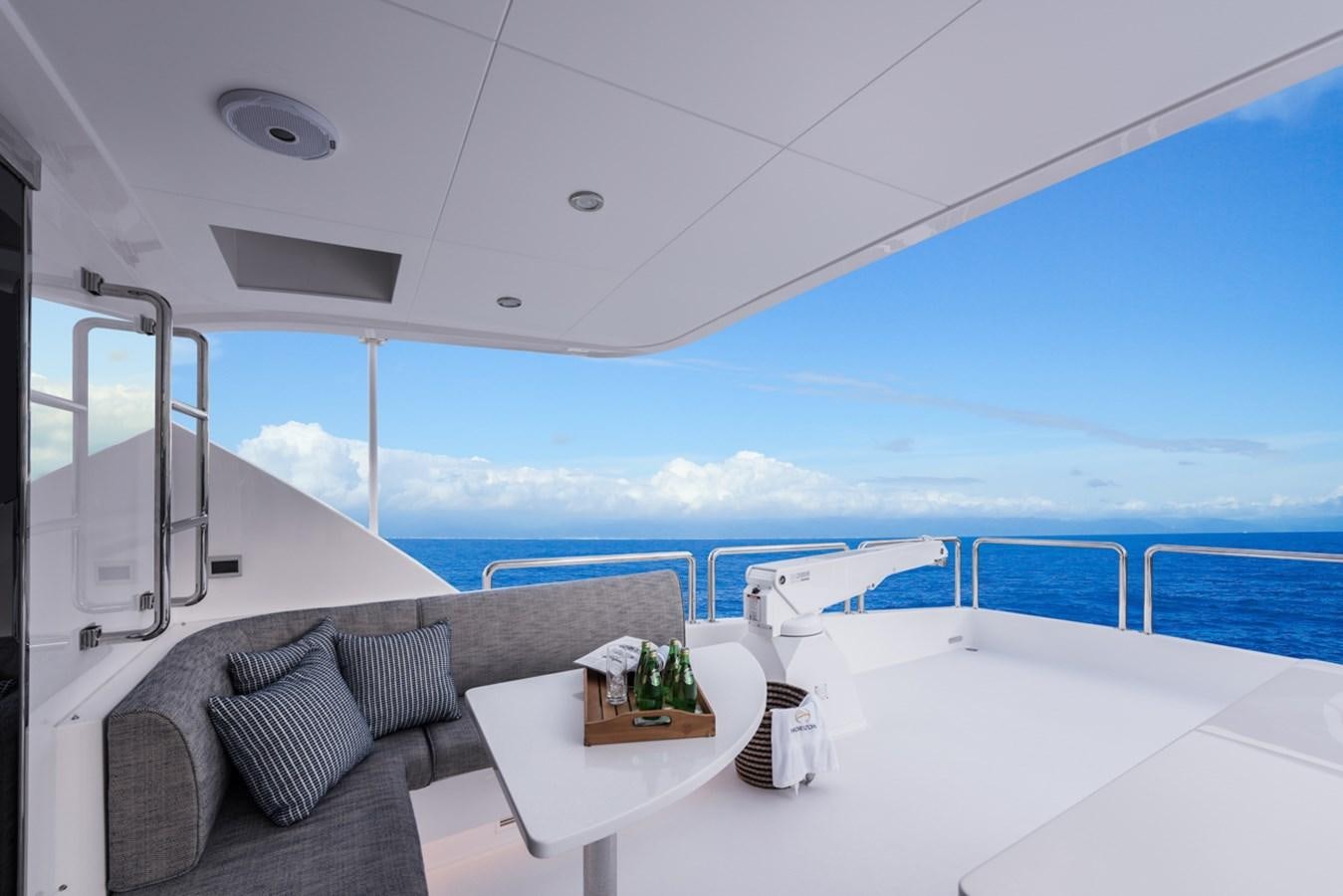 a room with a table and chairs aboard E84 (NEW BOAT SPEC)  Yacht for Sale