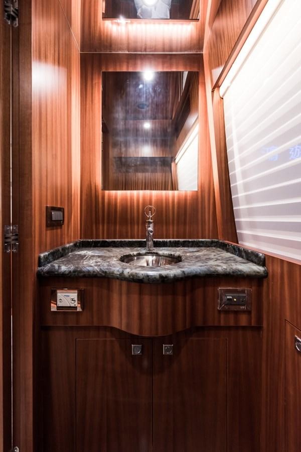 a sink in a wooden bathroom aboard E84 (NEW BOAT SPEC)  Yacht for Sale