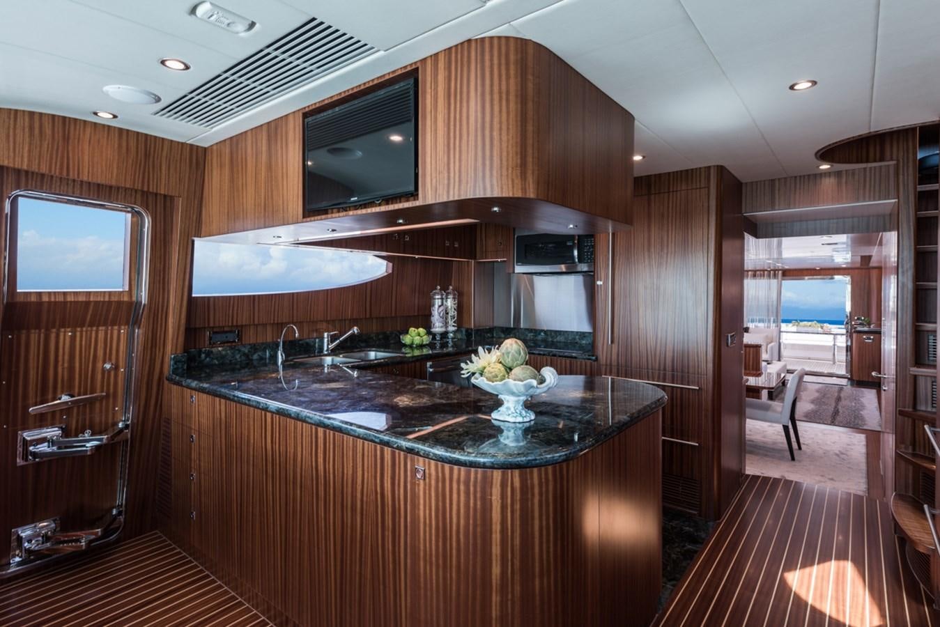 a kitchen with a large island aboard E84 (NEW BOAT SPEC)  Yacht for Sale