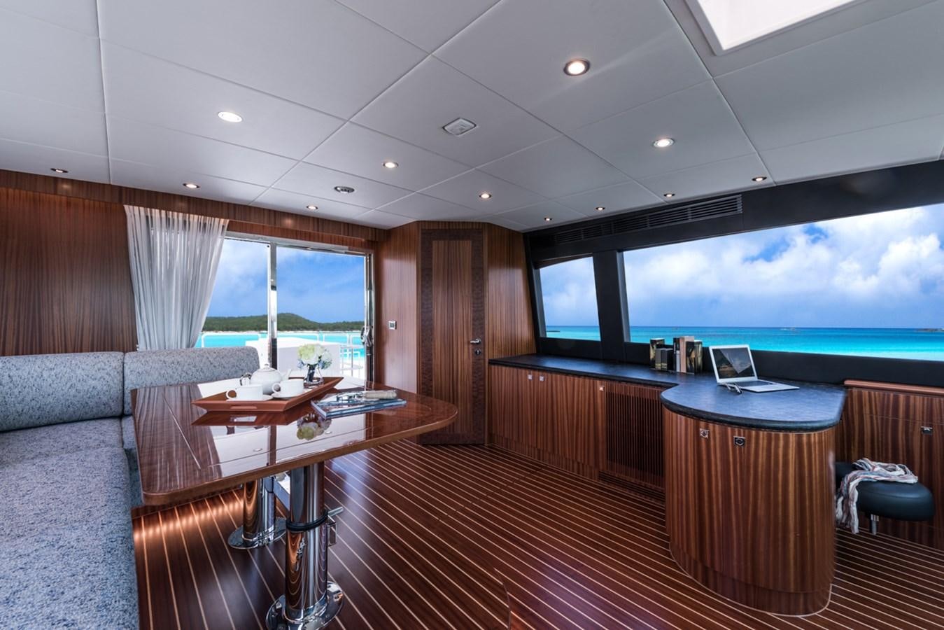 a room with a large screen aboard E84 (NEW BOAT SPEC)  Yacht for Sale