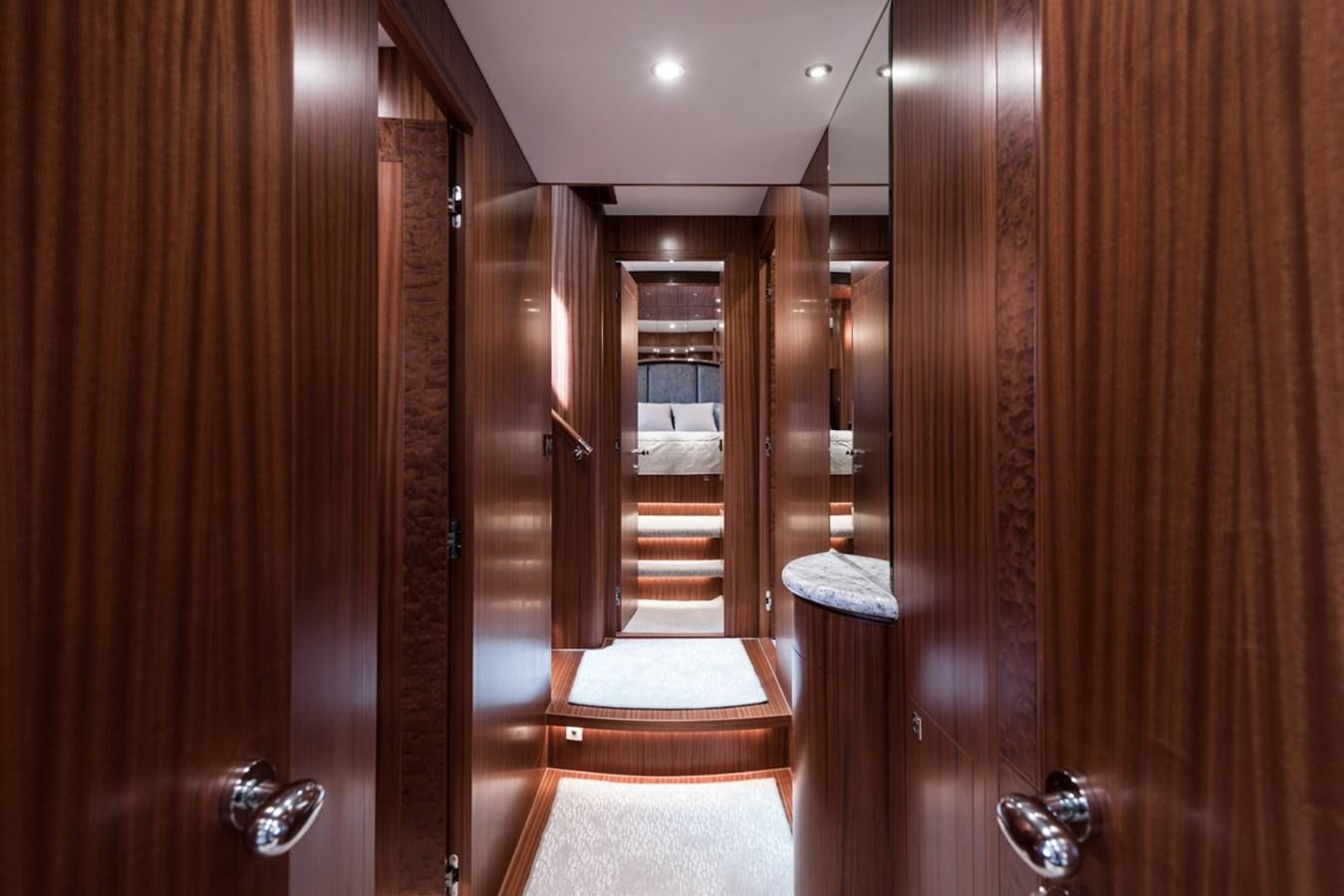 a room with wooden doors aboard E84 (NEW BOAT SPEC)  Yacht for Sale