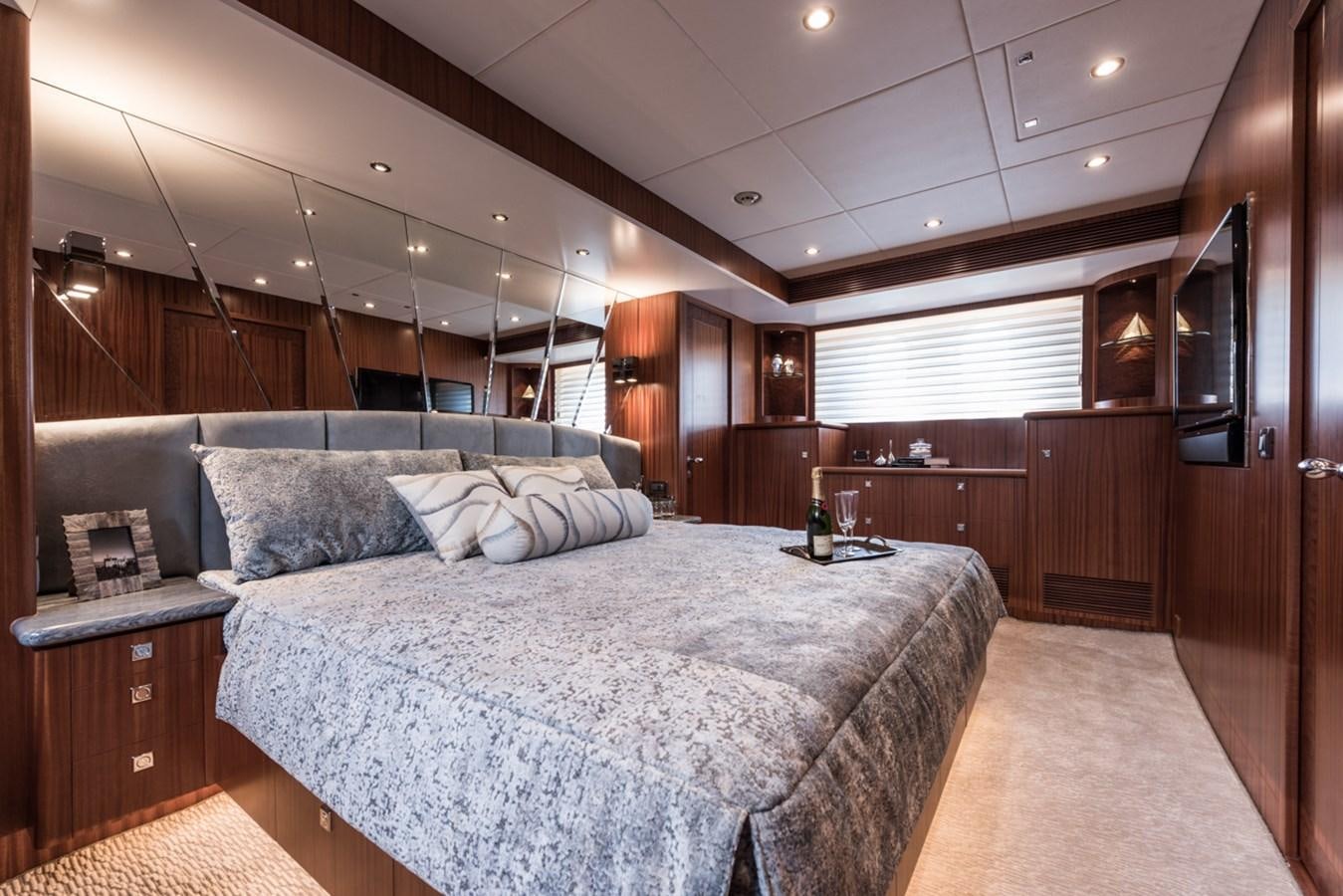a large bed in a room aboard E84 (NEW BOAT SPEC)  Yacht for Sale