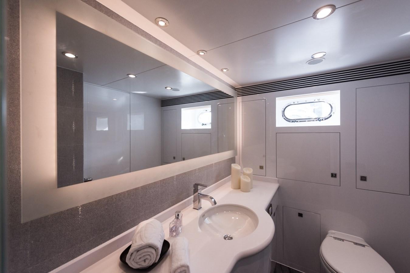 a bathroom with a large mirror aboard E84 (NEW BOAT SPEC)  Yacht for Sale