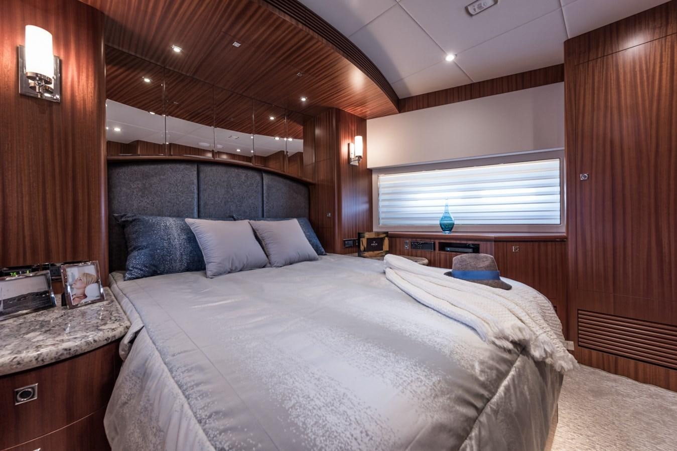 a bed in a room aboard E84 (NEW BOAT SPEC)  Yacht for Sale