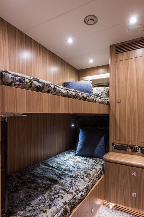 a bed in a room aboard E84 (NEW BOAT SPEC)  Yacht for Sale