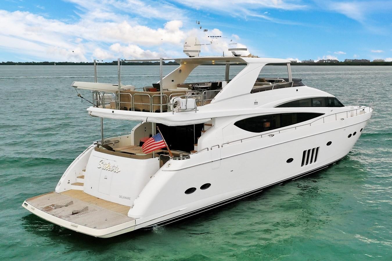 a white yacht on the water aboard PRINCESS 85 MY Yacht for Sale