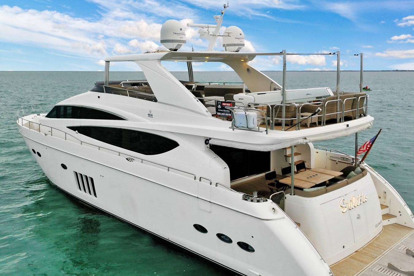 a white boat on the water aboard PRINCESS 85 MY Yacht for Sale