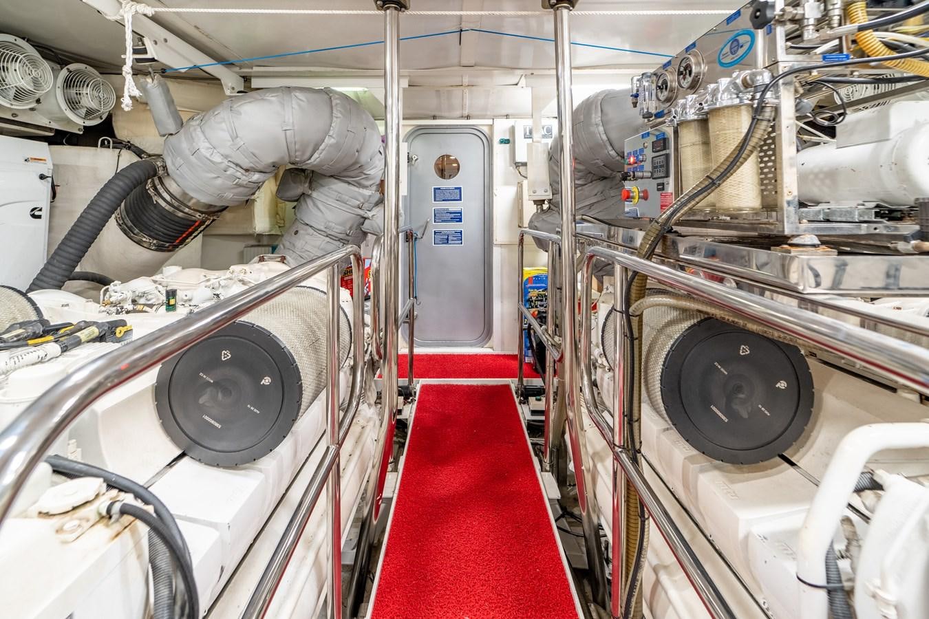 a large machine with a red floor aboard PRINCESS 85 MY Yacht for Sale