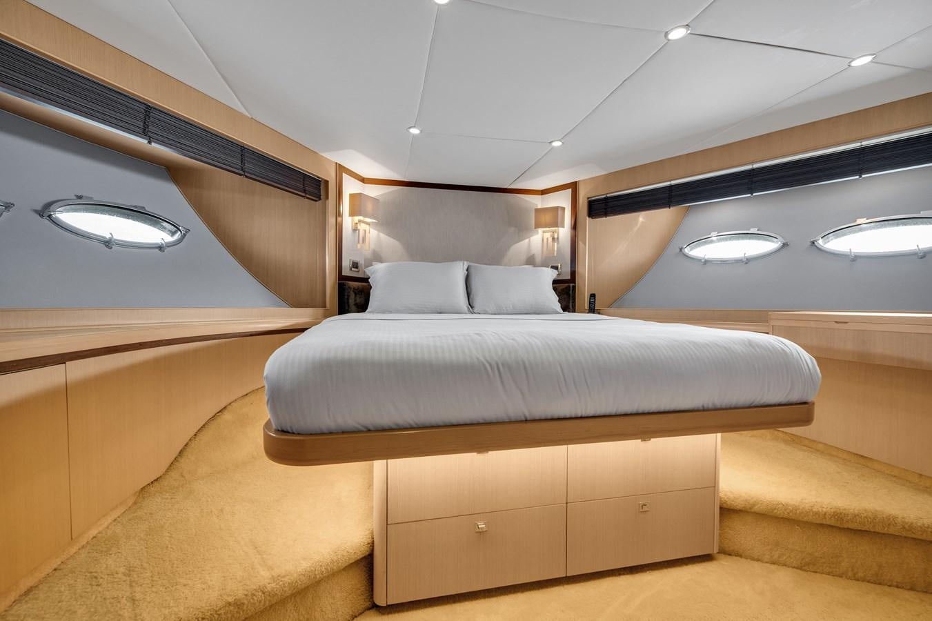 a bed in a room aboard PRINCESS 85 MY Yacht for Sale
