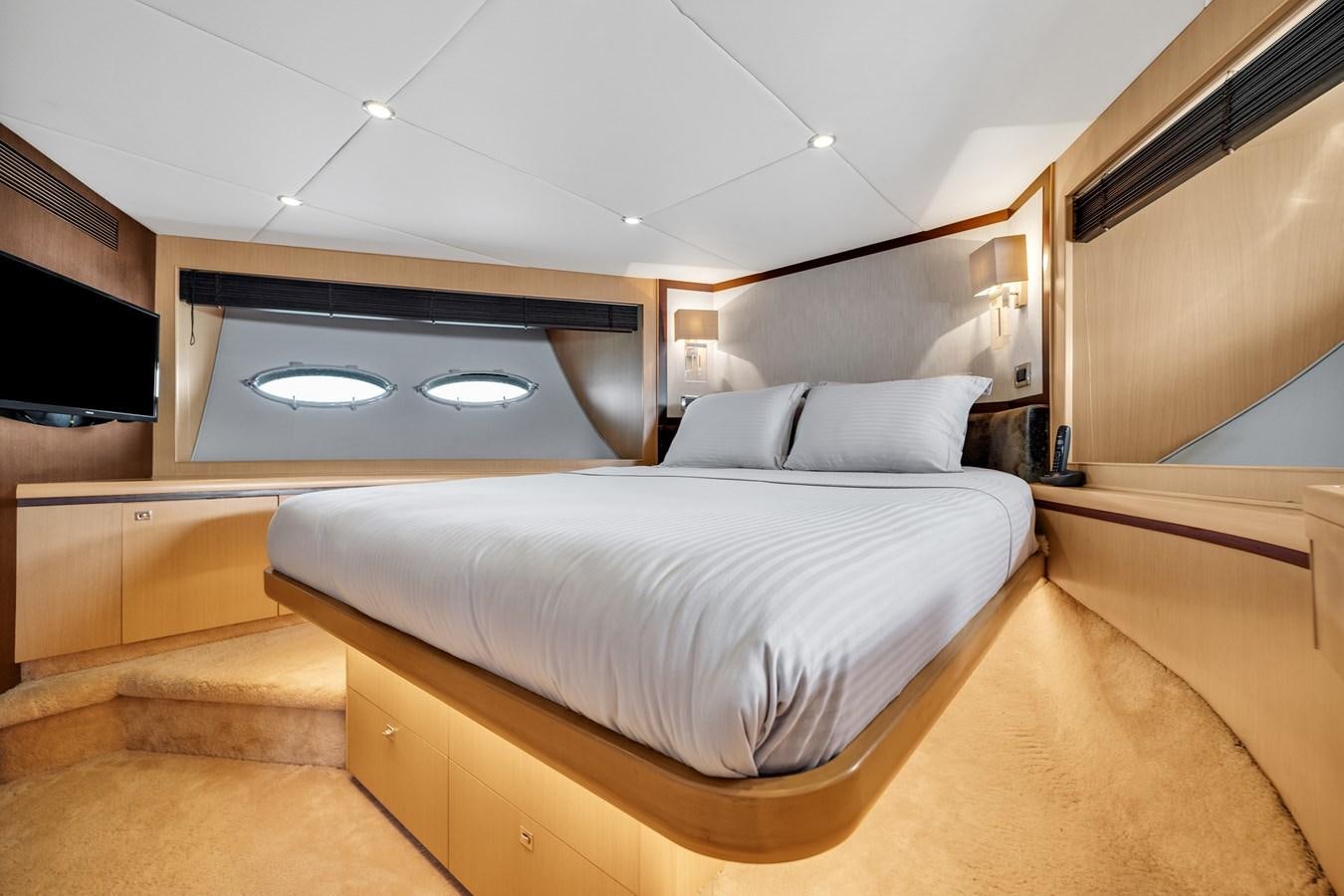 a large bed in a room aboard PRINCESS 85 MY Yacht for Sale
