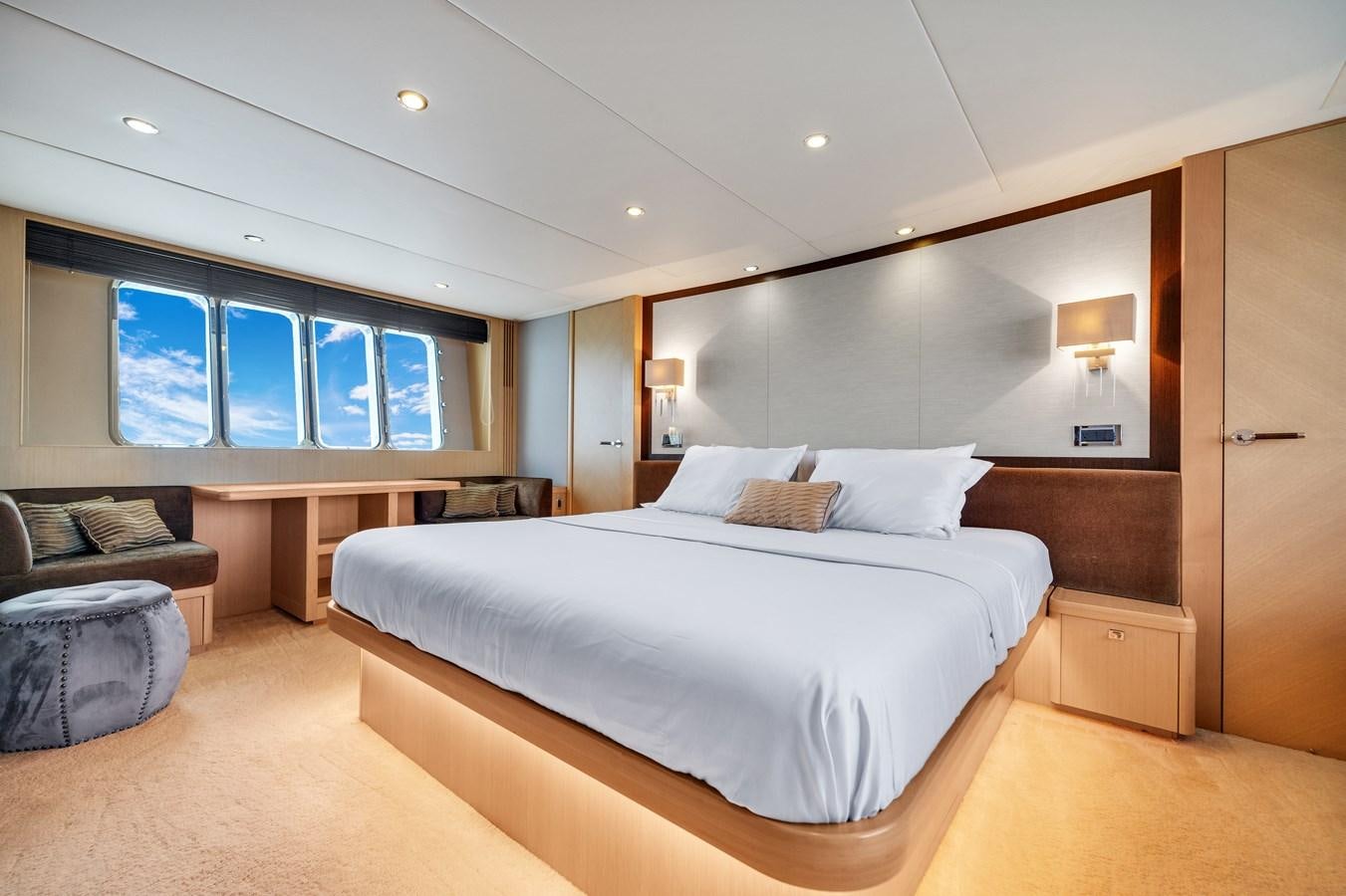 a large bed in a room aboard PRINCESS 85 MY Yacht for Sale