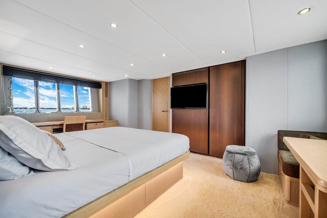 a bedroom with a large bed aboard PRINCESS 85 MY Yacht for Sale