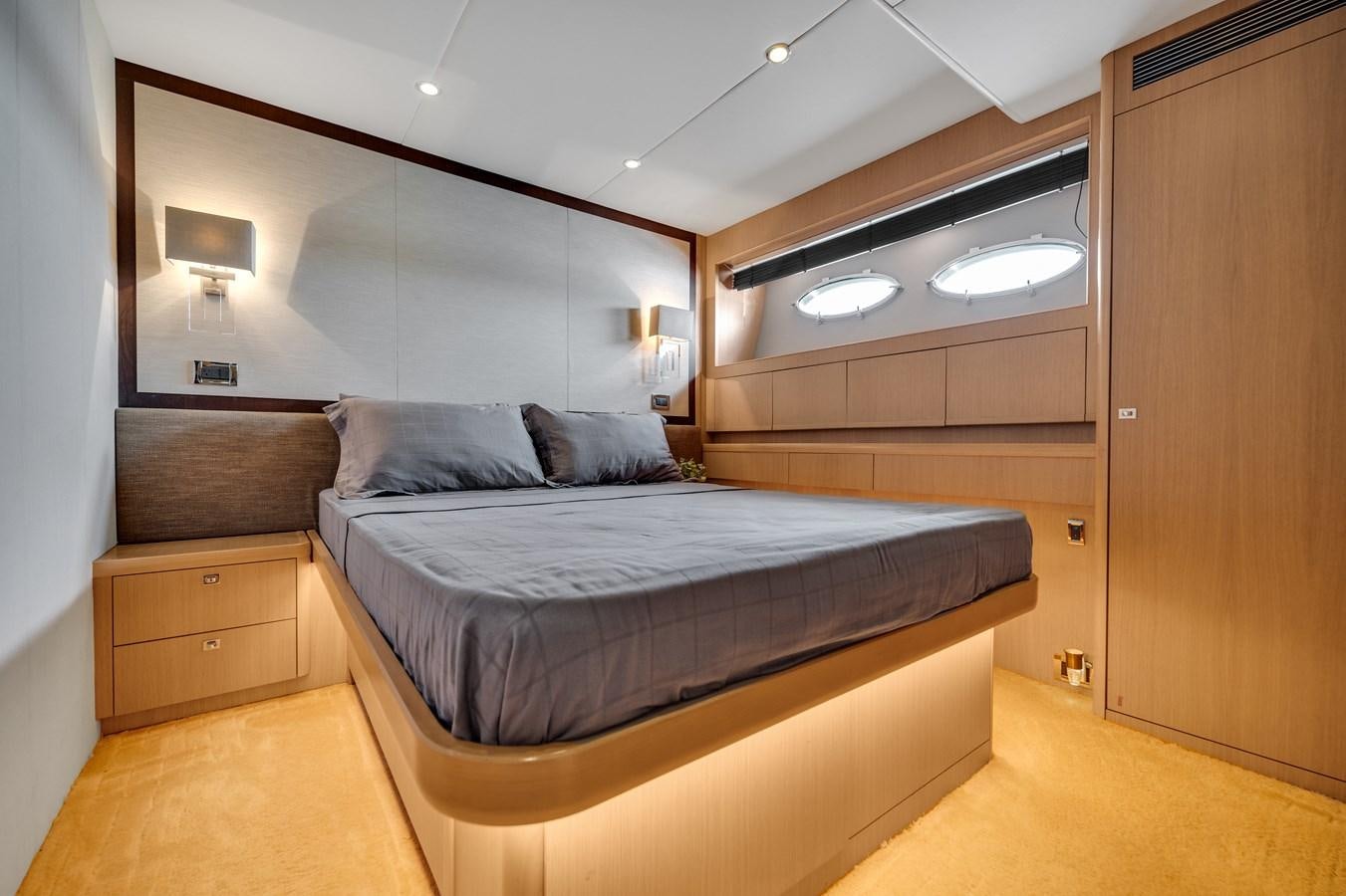 a bed in a room aboard PRINCESS 85 MY Yacht for Sale